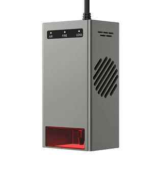 A metallic rectangular device hanging with a cord from the top. It has a small grille on one side and three labeled buttons (AIR, FIRE, LENS) on the front. The bottom section has a red translucent panel revealing some internal components, and features 40W power with multiple safety protections. This is the Creality Falcon2 40W Laser Module by CrealityFalcon.