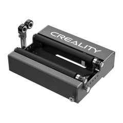 A component from Creality Falcon, known as the "Rotary Roller for Laser Engraving Machine," consists of a set of rollers on a sleek, rectangular base with adjustable width. This expertly crafted piece facilitates precise material feeding or engraving cylindrical objects of varying diameters in a 3D printing setup.