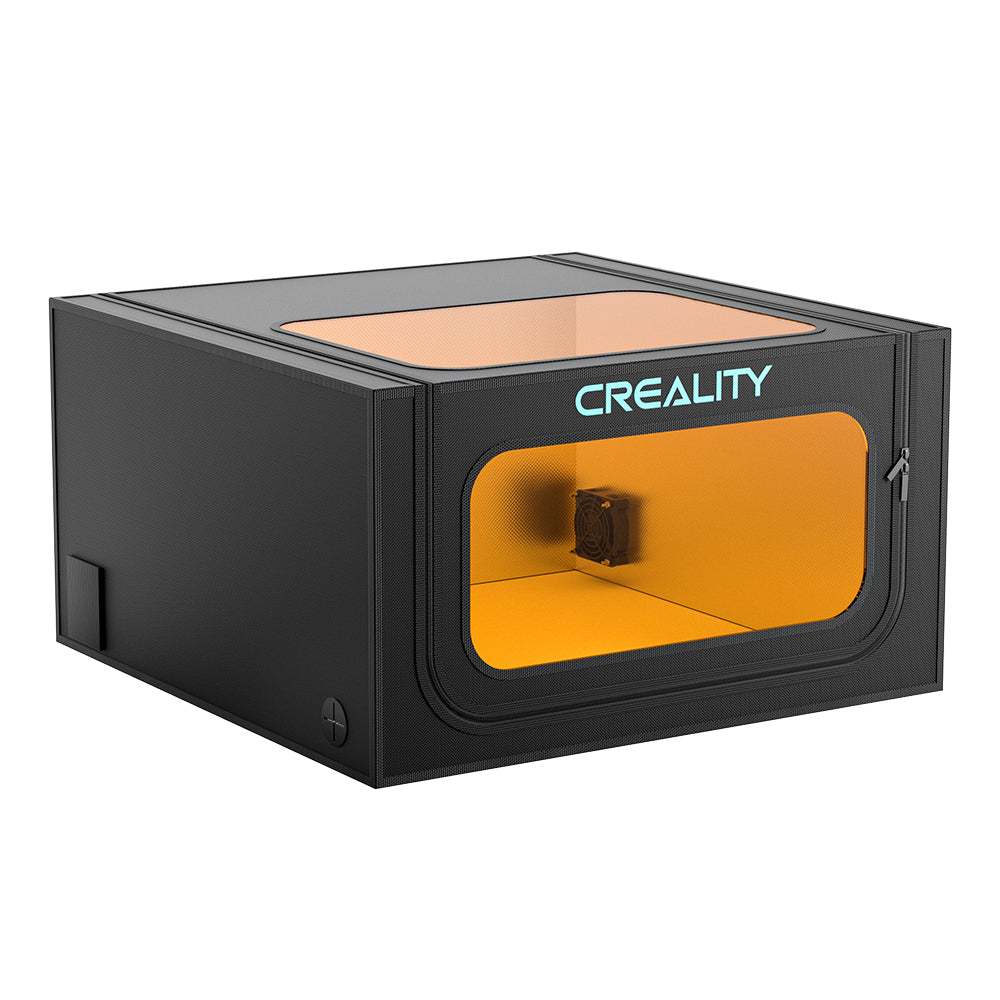 The black rectangular Protection Enclosure Pro for Falcon Laser Engravers from CrealityFalcon features a transparent amber front panel with a zippered door and a clear top window. Dustproof and smokeproof, the sleek, modern design keeps your laser engraver in optimal condition while remaining visually accessible.