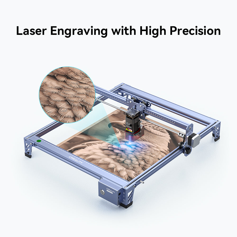 A CR-Laser Falcon 5W Laser Engraver by CrealityFalcon is shown in operation, precisely etching an intricate feather design onto a surface. The text "Ultra-Fine Engraving Precision" is displayed at the top of the image. A magnified section highlights the detailed feather pattern.