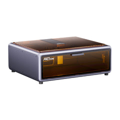 The Creality Falcon A1 10W Enclosed Laser Engraver and Cutter features a sleek rectangular design with CoreXY technology, an orange semi-transparent cover, and gray body. It has Auto Materials Recognition and a modern compact build suitable for any desktop space.