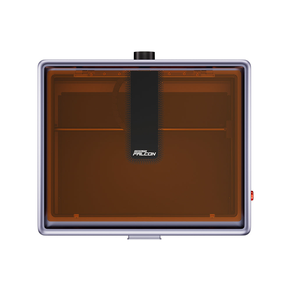 The Creality Falcon A1 10W Enclosed Laser Engraver and Cutter has a translucent orange cover, a rectangular design with CoreXY technology, a central logo panel, and top control knob. Its compact metallic frame fits anywhere and features auto material recognition plus a small red side button.