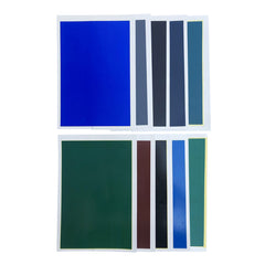 A set of eight rectangular sheets of colored paper, ideal for use with a laser engraver, are arranged in two rows. The top row features four sheets in blue, light gray, dark gray, and teal. The bottom row has four sheets in green, maroon, black, and dark blue. All sheets have white borders. This product is the 10pcs Laser Carved Colored Paper Ceramic Stone Material Color Paper for Falcon Laser Engraving by CrealityFalcon.